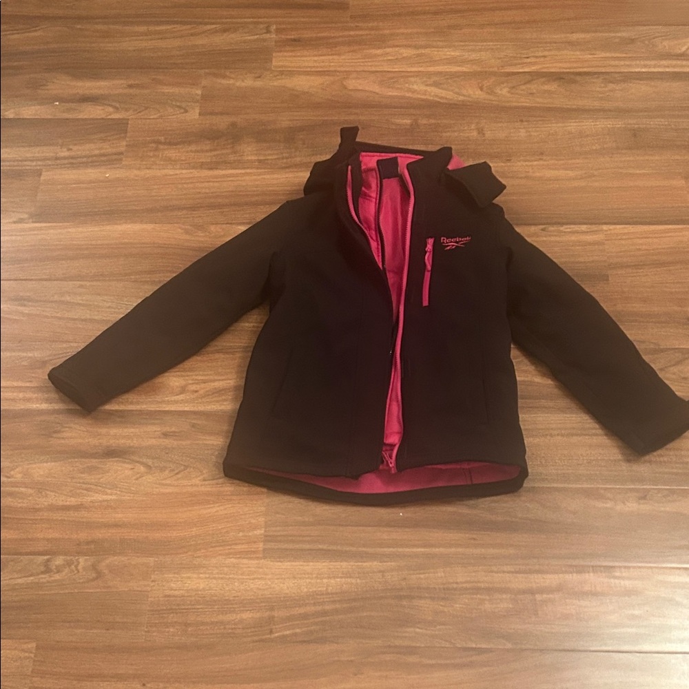 Reebok Girls Black Jacket with Vibrant Pink Highlights